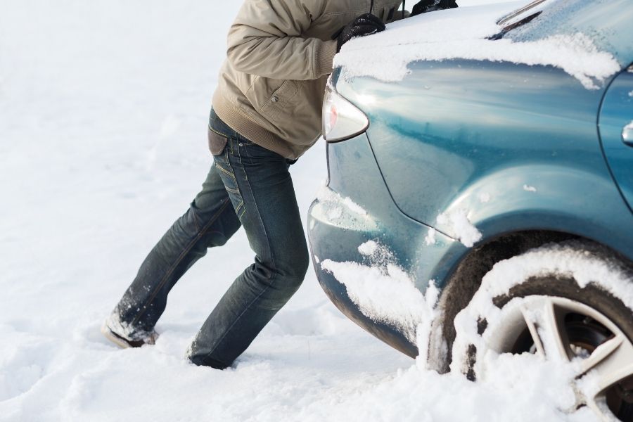 Car stuck in winter snow